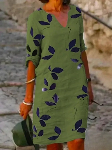 Damska sukienka w kwiaty z rękawami 3/4