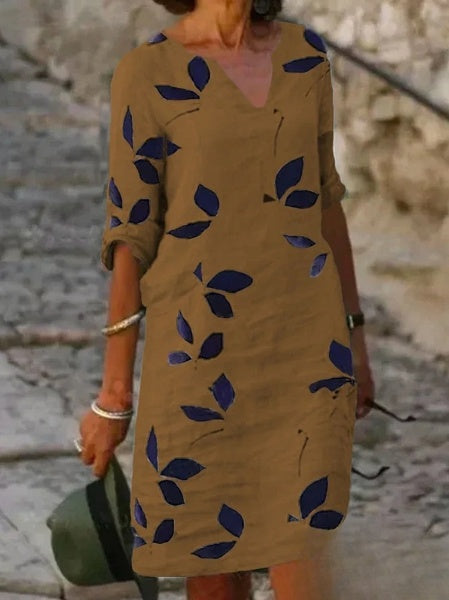 Damska sukienka w kwiaty z rękawami 3/4