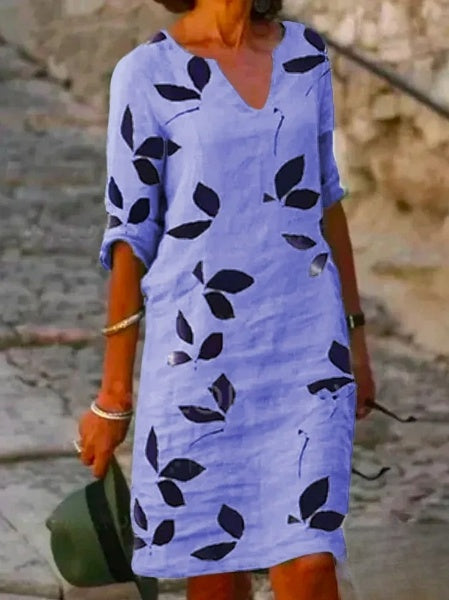 Damska sukienka w kwiaty z rękawami 3/4