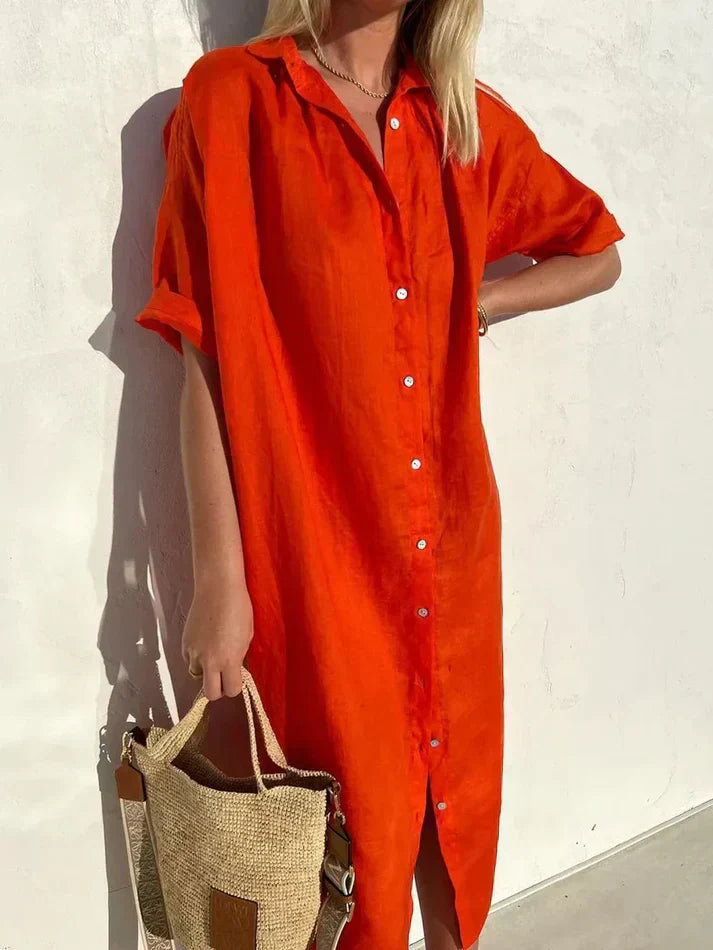 Elegancka i komfortowa sukienka damska z szerokimi rękawami i zapięciem na guziki, wykonana z bawełny i lnu